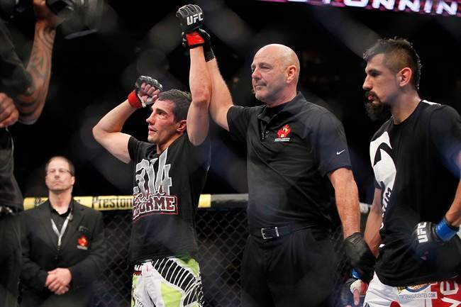 Roland Delorme defeats Edwin Figueroa in a bantamweight bout during UFC 161 in Winnipeg on June 15.