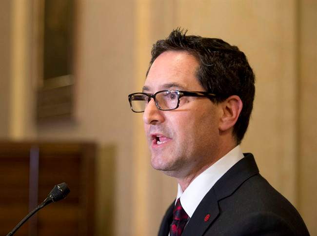 Montreal Mayor Michael Applebaum announces his resignation at a news conference in Montreal, Tuesday, June 18, 2013.