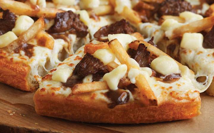A delivery man's pizza was stolen early Wednesday.
