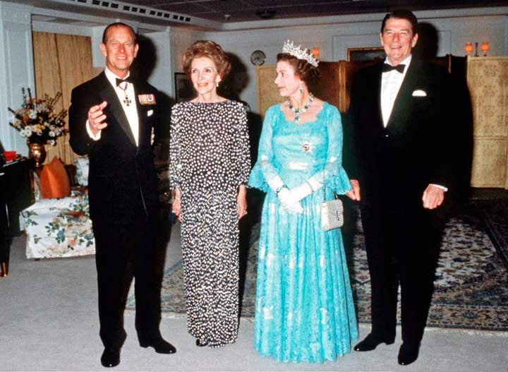 Queen Elizabeth II and Prince Phillip the Duke of Edinburgh on Britannia with US President Ronald Reagan and his wife Nancy Reagan in 1983. (Photo credit: Getty Images)
