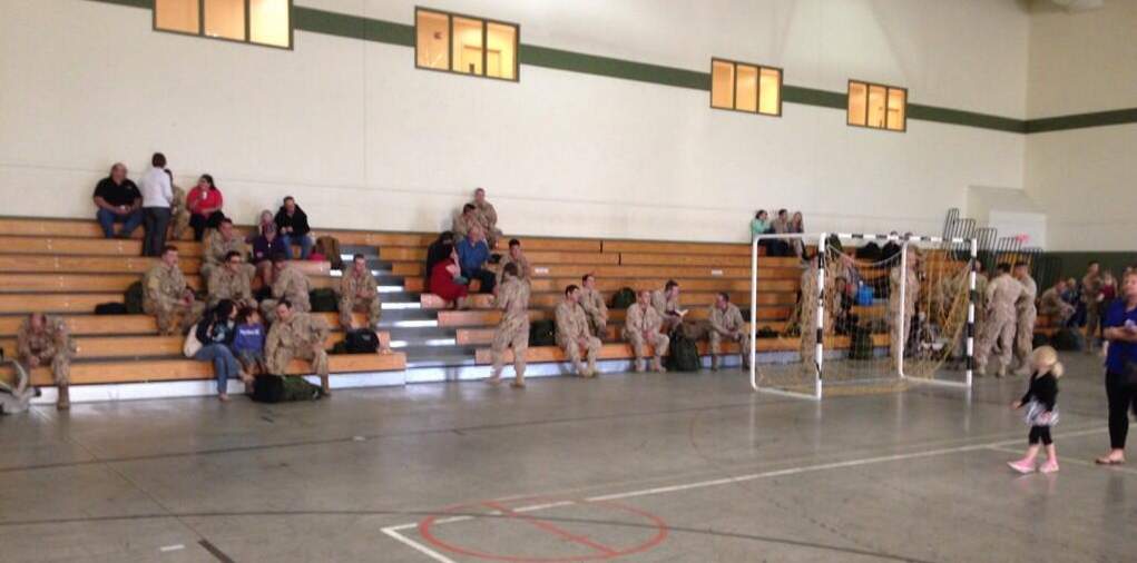 Families gather at CFB Shilo to say farewell to soldiers departing for Afghanistan on Monday.