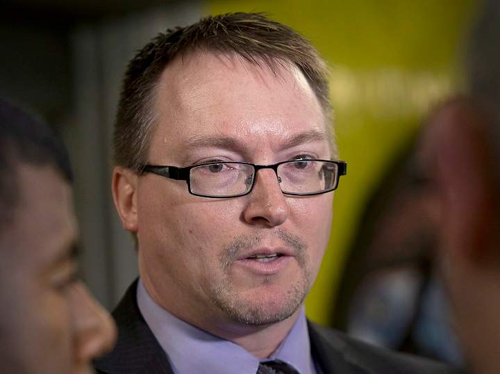 MLA Trevor Zinck talks with reporters outside Nova Scotia Supreme Court in Halifax on Monday, June 17, 2013.