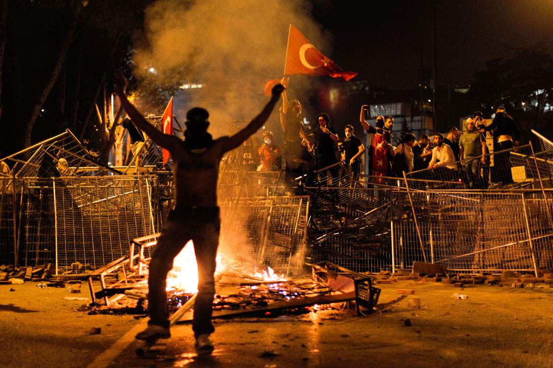 Protestors clash with riot police between Taksim and Besiktas in Istanbul, on June 1, 2013, during a demonstration against the demolition of the park. 
