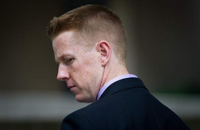 RCMP Const. Bill Bentley leaves court after the second day of his perjury trial in Vancouver, B.C., on Tuesday June 11, 2013. The Crown alleges the four RCMP offices involved in Robert Dziekanski's death "colluded" together to come up with a story about what happened and then attempted to cover up that collusion at a public inquiry.The allegations come at a pre-trial hearing for Const. Bentley, who is accused of lying six times at the inquiry into what happened when Dziekanski was stunned with a Taser at Vancouver's airport.