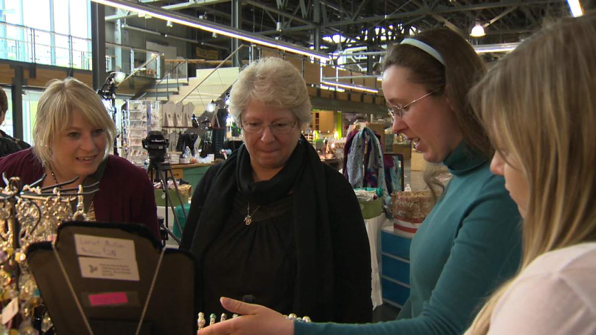 Victoria Cutler, 25, has autism and hopes the exposure of the farmers market better prepares her for a real job.