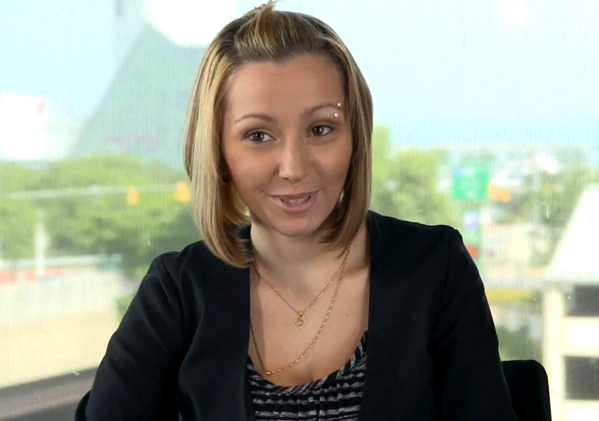 FILE- This file still frame made from the video posted July 8, 2013, provided by Hennes Paynter Communications shows Amanda Berry in a YouTube video in which three women held captive in a Cleveland home for a decade broke their public silence about their experience.