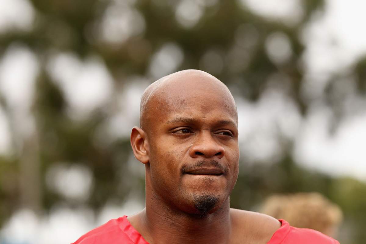 STAWELL, AUSTRALIA - MARCH 30: Asafa Powell of Jamaica looks on after competing in the Australia Post Stawell Gift Heat 11 during the 2013 Stawell Gift carnival at Central Park on March 30, 2013 in Stawell, Australia.