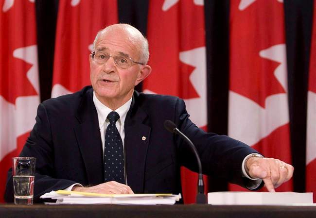 Ret. justice Frank Iacobucci points to a report in Ottawa on Oct. 21, 2008. THE CANADIAN PRESS/Adrian Wyld