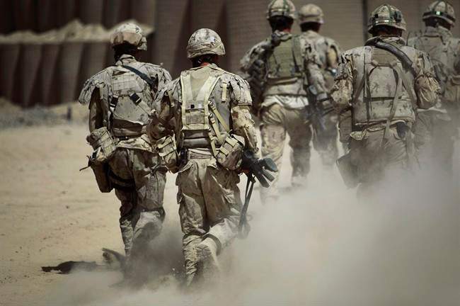 Canadian soldiers shown on patrol outside Salavat, in the Panjwayi district, southwest of Kandahar, Afghanistan, Monday, June 7, 2010.