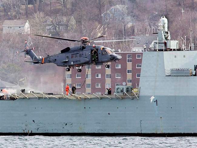 A Canadian military CH-148 Cyclone conducts training exercises with HMCS Montreal in Halifax harbour on March 29, 2010.