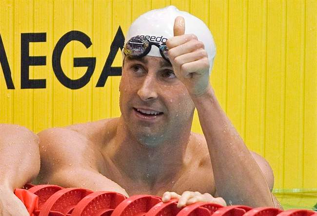 Benoit Huot reacts after winning the 100-metre event at the Canadian Paralympic Swimming Trials in Montreal, March 30, 2012.