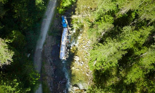 Driver who spilled jet fuel into Lemon Creek drove around closure barricade - image
