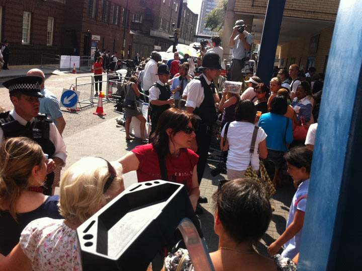 Police are continually having to shoo away gawkers from the door of the Lindo Wing at Saint Mary’s hospital so patients can access the hospital. July 22, 2013. (Photo credit: Sean Mallen, Global News)