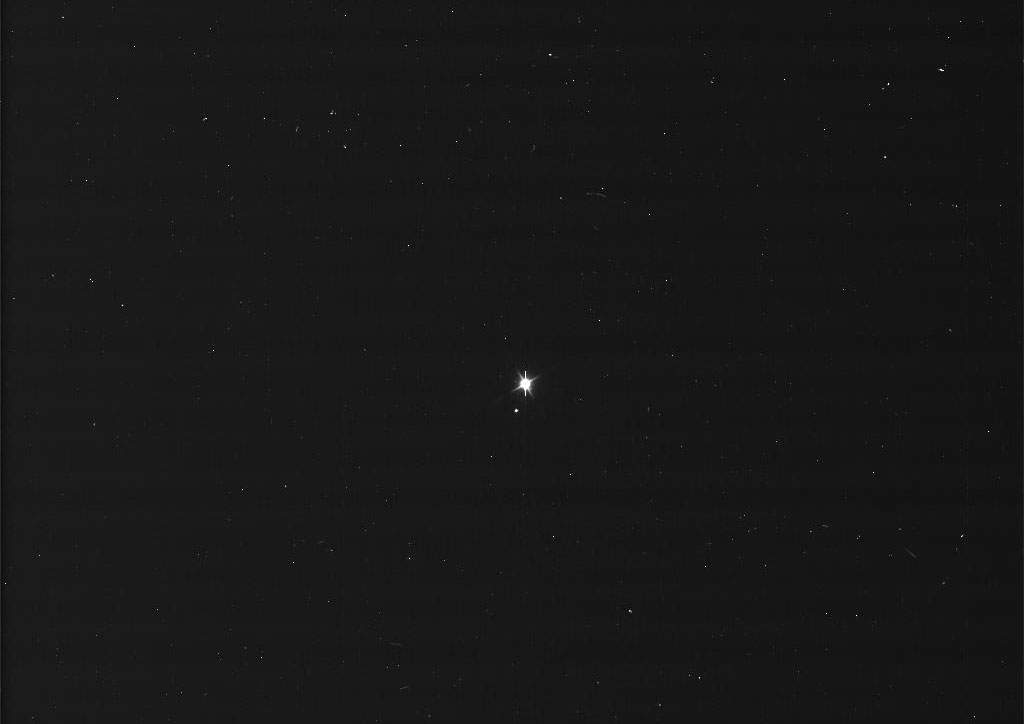 Earth and the moon seen from Saturn. On July 19, the Cassini spacecraft imaged Earth for 15 minutes in natural colour.