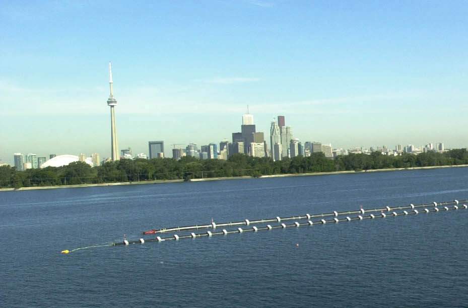 The final section of EnWave’s Deep Lake Water Cooling pipe is ready to be placed under water in this photo from August 2003.
