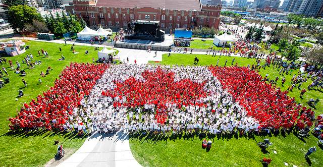 Organizers hosted a ‘living flag’ in Calgary on Canada Day 2013.
