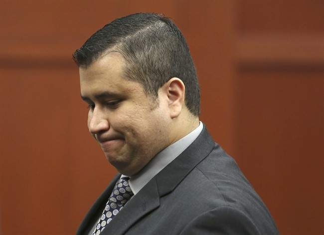 George Zimmerman leaves the courtroom during a recess in his trial in Seminole circuit court in Sanford, Fla. Wednesday, July 10, 2013.