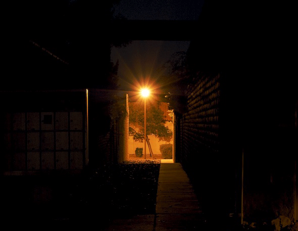 An example of ineffective lighting. The light used here isn’t lighting up the walkway, but rather the area above it. (International Dark-Sky Association)