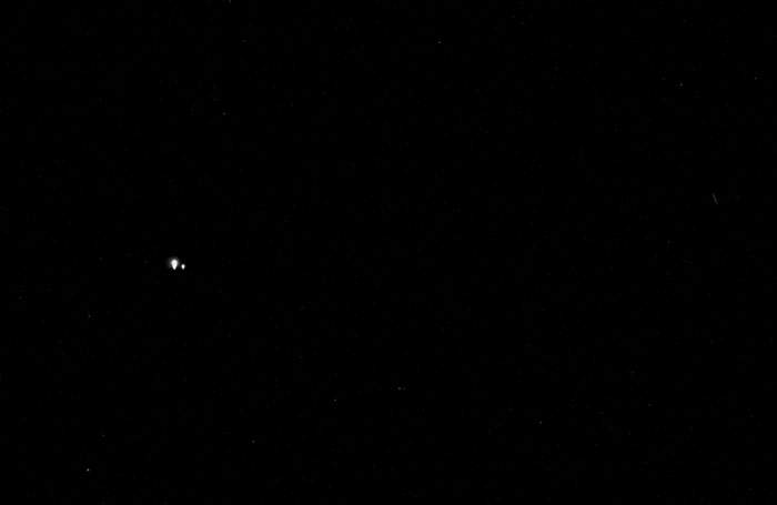 Earth, the brightest of the two, and the moon, as seen from Mercury.