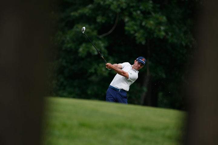 Mike Weir of Canada hits a shot during the third round of the John Deere Classic held at TPC Deere Run on July 13, 2013 in Silvis, Illinois. (Photo credit: Michael Cohen/Getty Images)