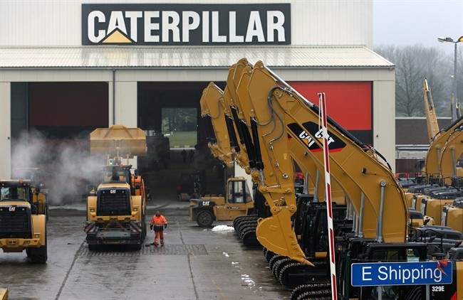 FILE - This Thursday, Feb. 28, 2013, file photo shows a parking lot at Caterpillar Belgium, in Gosselies, Belgium. 