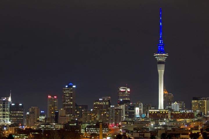 The Sky Tower lit up blue in Auckland, New Zealand.