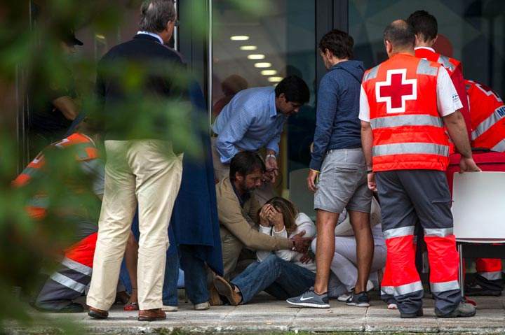 Relatives of passengers involved in the train crash wait for news at the Cersia Building on July 25, 2013 in Santiago de Compostela, Spain.