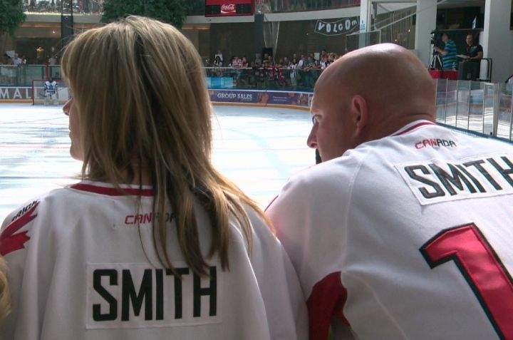 Cindy and Scott Smith cheer on their son