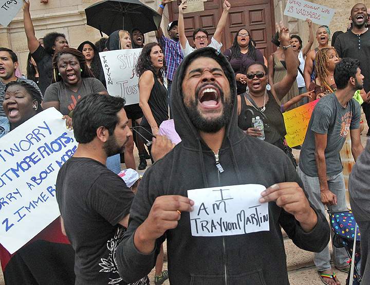 James Alvarez attends a vigil for Trayvon Martin in Miami, Florida, Sunday, July 14, 2013. George Zimmerman was found not guilty in the shooting death of Martin. (Getty Images)