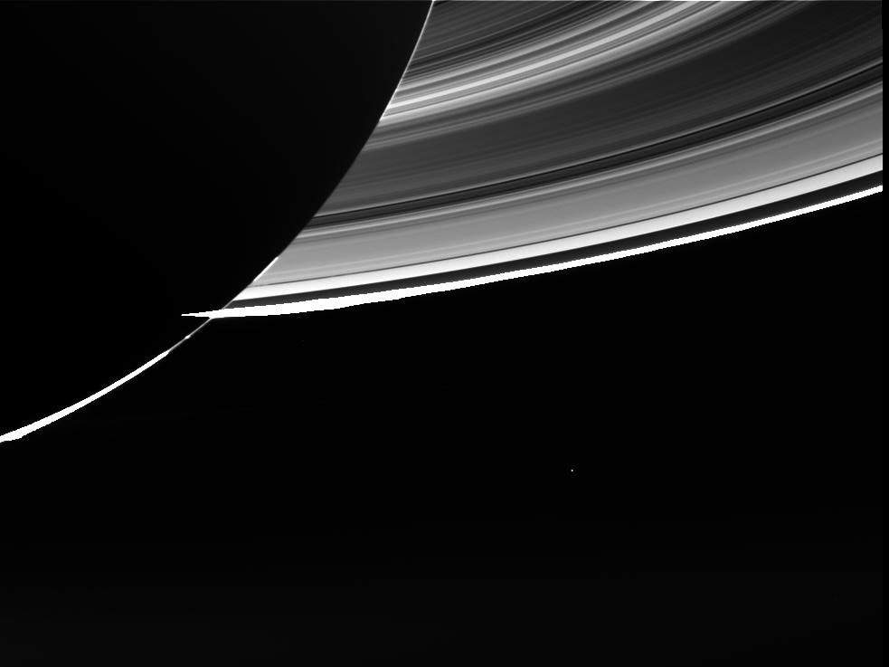 A raw image of Earth seen from Saturn. Earth is the small, bright spot seen at lower centre.