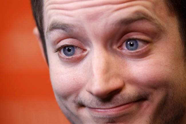  In this Friday, Jan. 20, 2012 file photo, actor Elijah Wood is interviewed at the 2012 Sundance Film Festival in Park City, Utah. 