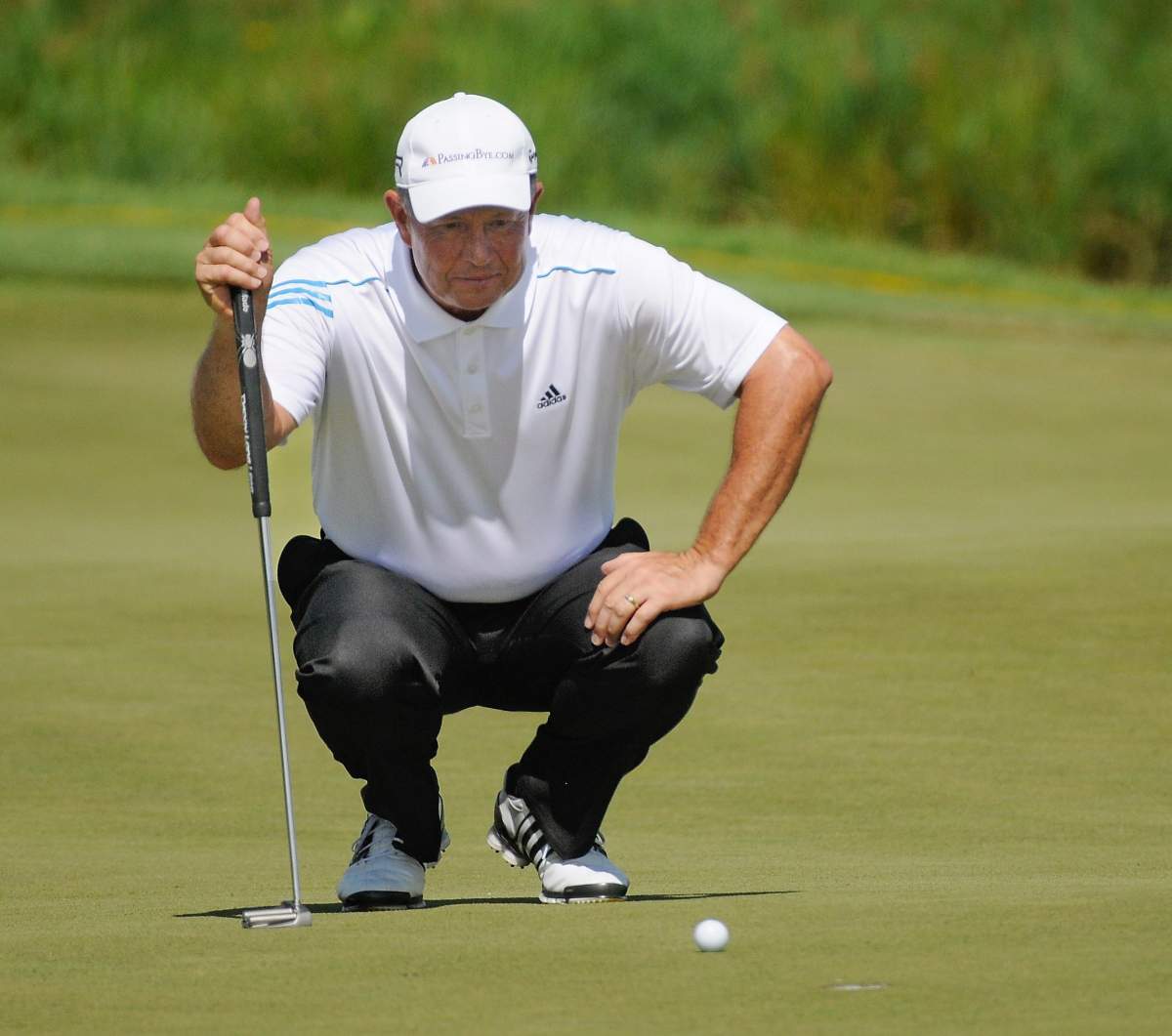 Rod Spittle lines up a shot on the 18th hole during the second round of the 3M Players Championship golf tournament at TPC Twin Cities golf course Saturday, Aug. 3, 2013,  in Blaine, Minn.