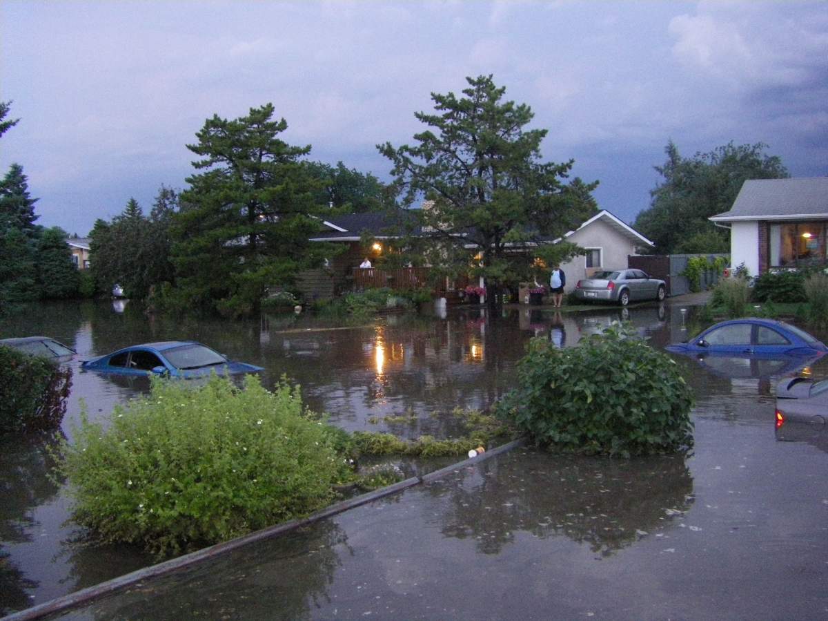 Flooding in Tweddle Place in south-east Edmonton in July 2012.