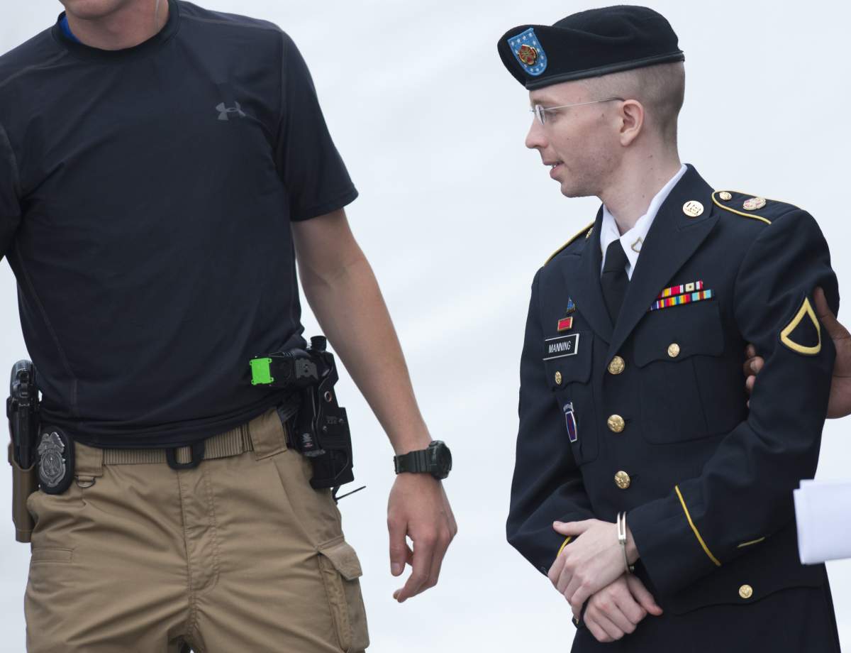 US Army Private First Class Bradley Manning leaves a military court facility after hearing his verdict in the trial at Fort Meade, Maryland on July 30, 2013. A US military judge convicted Bradley Manning of espionage Tuesday, leaving him facing a lengthy jail term despite clearing him on the most serious charge that he 'aided the enemy.' Colonel Denise Lind found Manning guilty of 20 of 22 counts related to his leaking of a huge trove of secret US diplomatic cables and military logs to the WikiLeaks website. She said she would begin sentencing hearings on Wednesday, at the Fort Meade military base outside Washington where the trial was held. If Lind decides to impose penalties in the higher ranges permitted under the charges, the now 25-year-old Manning could face a de facto life sentence of more than 100 years in jail.