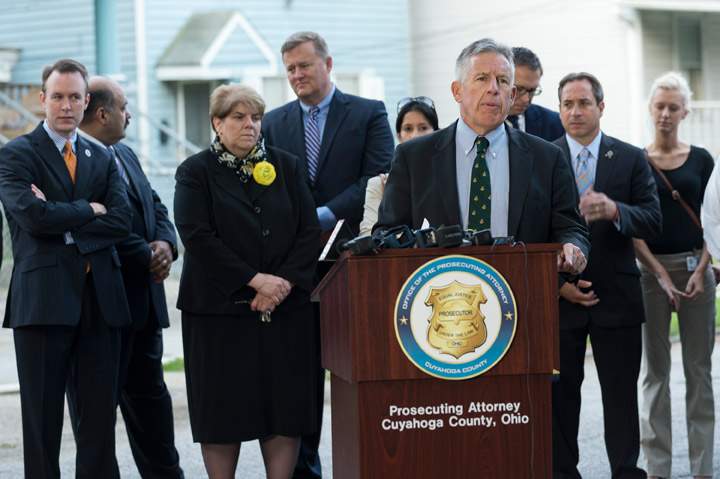 Summit County Prosecutor Tim McGinty addresses press on August 7, 2013 in front of the home of Ariel Castro in Cleveland, Ohio. (Photo credit: Getty Images)