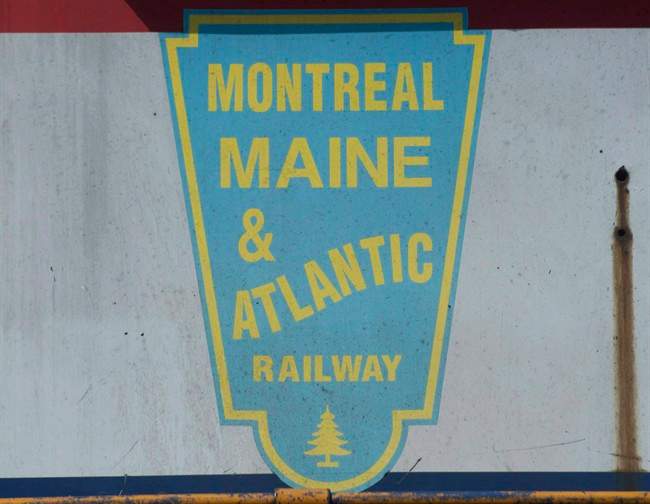 A logo for Montreal Maine and Atlantic railway
