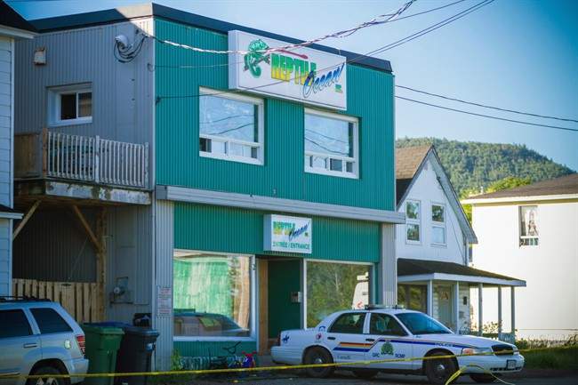 An RCMP cruiser sits outside Reptile Ocean in Campbellton, N.B., on August 6, 2013.