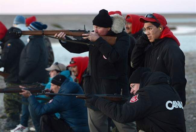 Harper goes target shooting with Canadian Rangers in Arctic - image