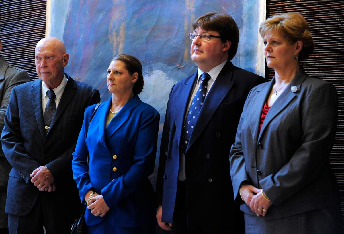 In the image taken Monday Oct. 24, 2011 John Wesley Walker, left, and his wife Princess Irina of Romania, center left, Alexander Phillips Nixon, center right, and Princess Elena of Romania attend the opening of an exhibition in Bucharest. A Romanian princess and her husband, a former sheriff's deputy, are apparently among several people federal agents arrested in Eastern Oregon on Thursday Aug. 15, 2013 in connection with an alleged cockfighting ring. Indictments unsealed in U.S. District Court in Portland charge Irina Walker, 60, and her husband John Wesley Walker, 67, with hosting cockfighting derbies and illegal gambling at their ranch outside the small Morrow County town of Irrigon. 