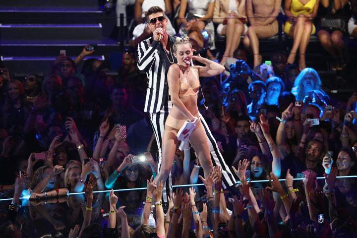Miley Cyrus and Robin Thicke perform onstage during the 2013 MTV Video Music Awards at the Barclays Center on August 25, 2013 in the Brooklyn borough of New York City. (Photo by Neilson Barnard/Getty Images for MTV)