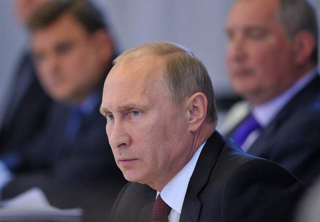 Russian President Vladimir Putin holds a meeting on the development of civil shipbuilding in Russia's fareastern port of Vladivostok, Friday, Aug. 30, 2013.