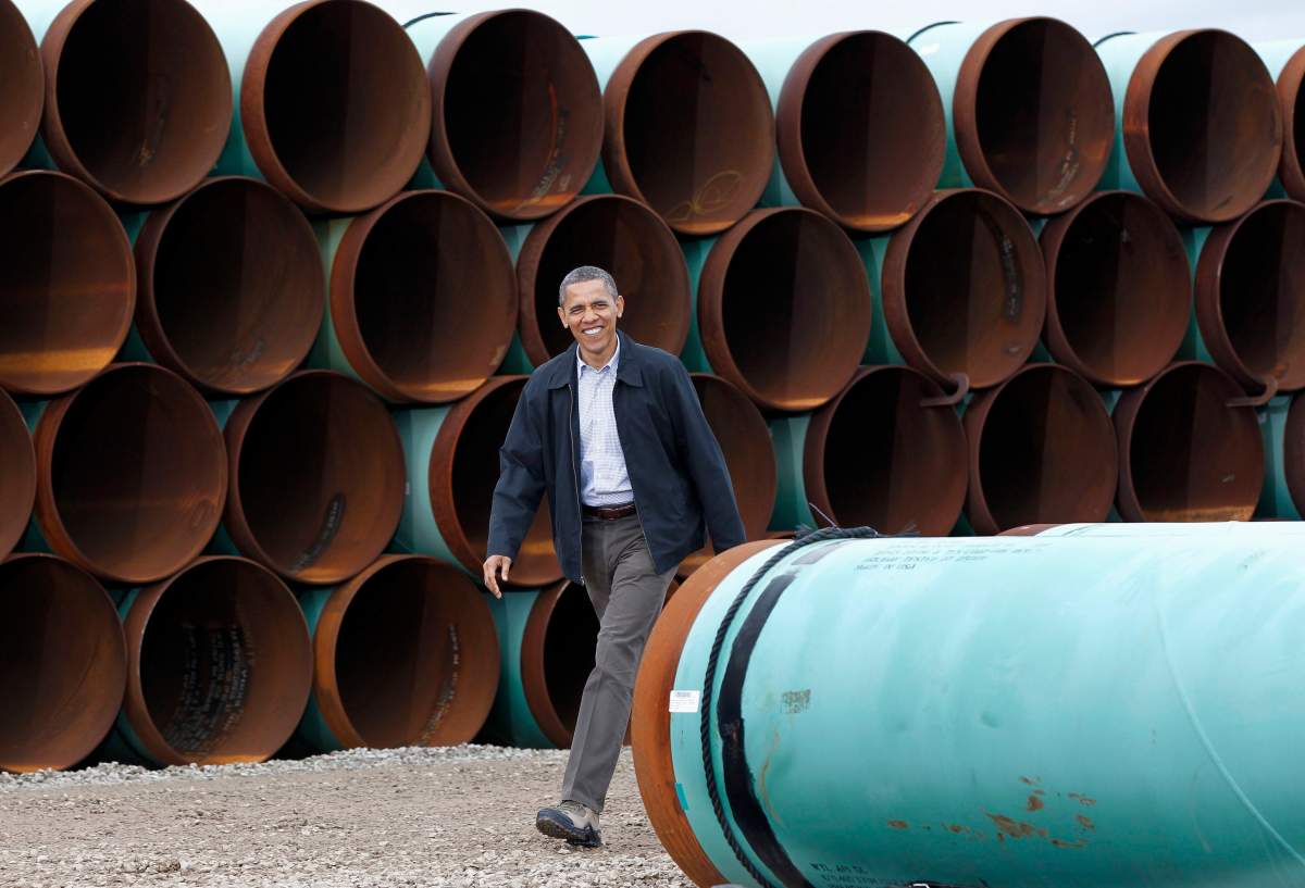 This March 22, 2012 file photo shows President Barack Obama arriving at the TransCanada Stillwater Pipe Yard in Cushing, Okla.