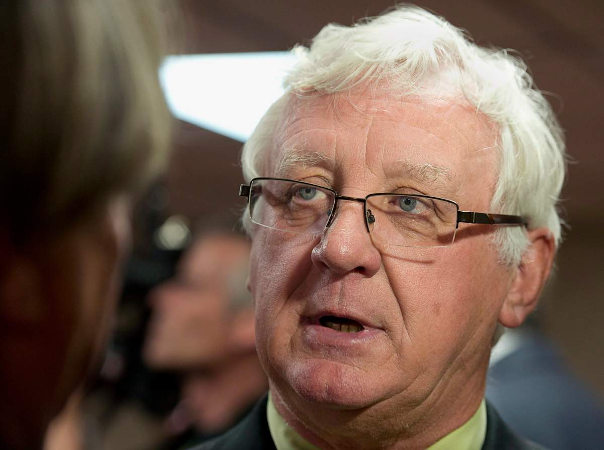 A veteran NDP member of the Nova Scotia legislature says he's considering taking the Liberal government to court if an election is called without first using a formal commission to redraw the province's electoral boundaries.