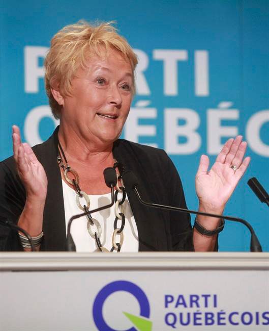 Quebec Premier Pauline Marois gestures as she speaks at the &amp;quot;Universite d'ete des jeunes du Parti Quebecois&amp;quot; event in Quebec City, Sunday, August 25, 2013. 