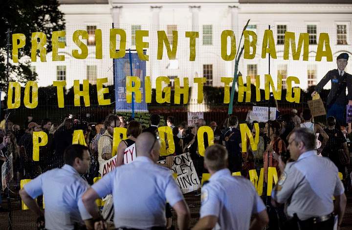 WASHINGTON, DC - AUGUST 21: Protesters demonstrate in support of Bradley Manning on August 21, 2013 in front of the White House in Washington, DC. Manning was sentenced to 35 years in prison for leaking hundreds of thousands of classified documents to the anti-secrecy group WikiLeaks.