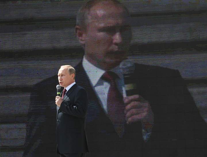Russian President Vladimir Putin delivers a speech at the opening of the Barmaley Fountain.