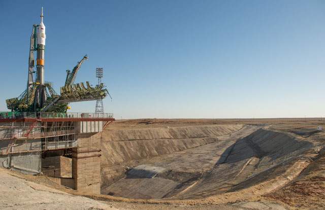 The Soyuz rocket is seen on its launch pad shortly after being lifted into its upright position on Monday, Sept. 23, 2013, at the Baikonur Cosmodrome in Kazakhstan. 