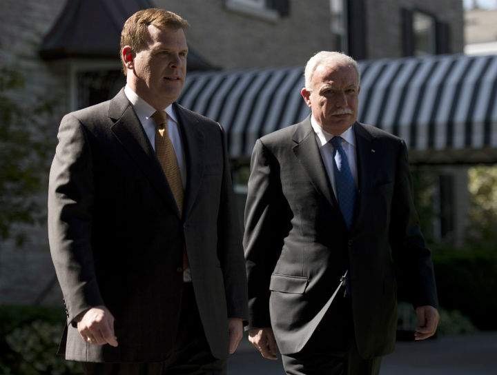 Foreign Affairs Minister John Baird walks to a joint news conference with Palestinian Authority Foreign Affairs Minister Riad Malki following a meeting, Thursday September 19, 2013 in Ottawa. 