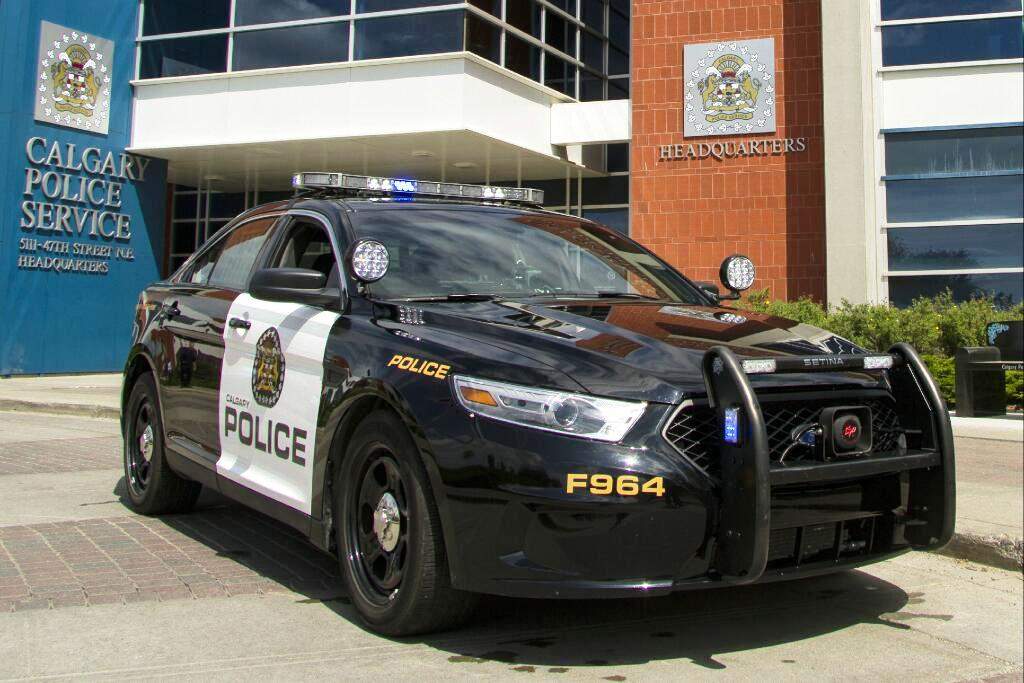 A Calgary Police Service cruiser in front of police headquarters.