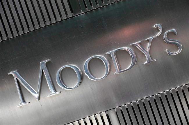 This Aug. 13, 2010 photo shows a sign for Moody's Corp. in New York. 